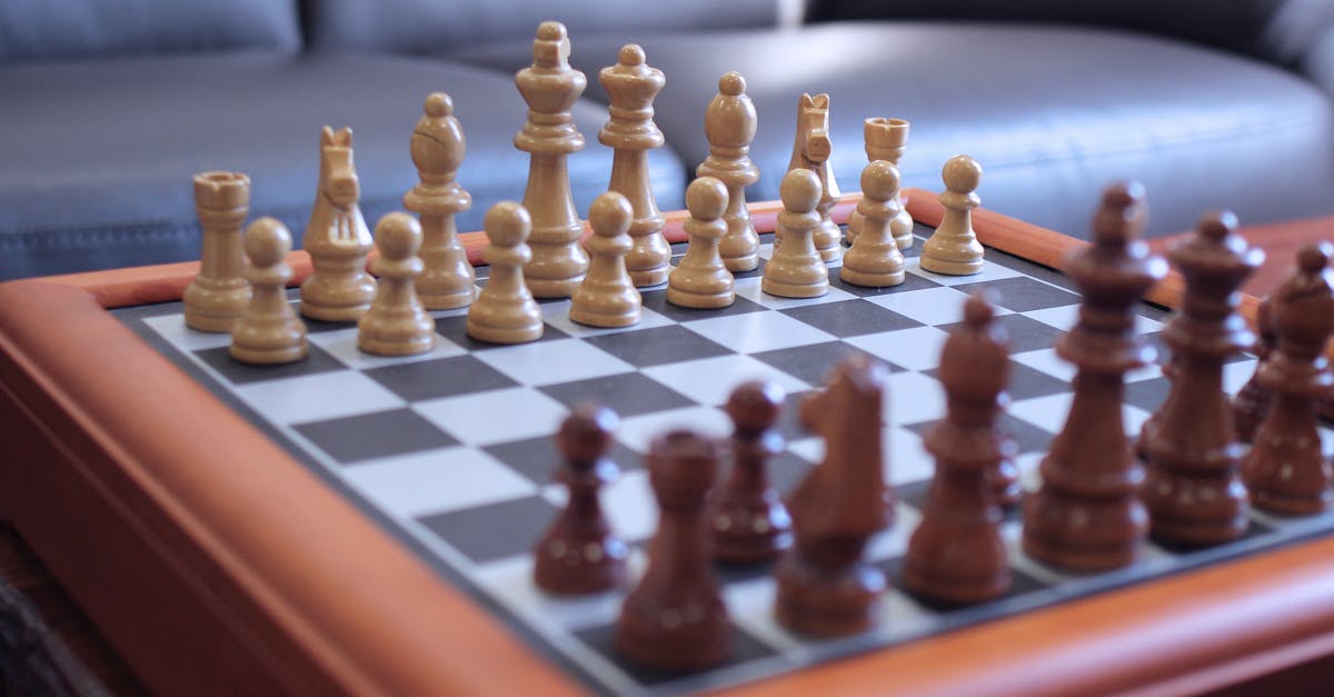 How did Crain know Arthur Bishop was in Thailand? - Brown,green, and White Chess Pieces