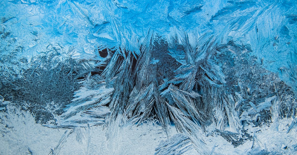How did Crystal get her gag off? - Close-up of Ice Texture on Frozen Surface