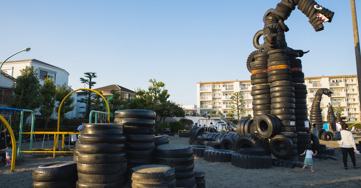 How did Frank figure out Jim was a spy? - Suburb yard playground with stacks of old tyres constructed in huge monster creature