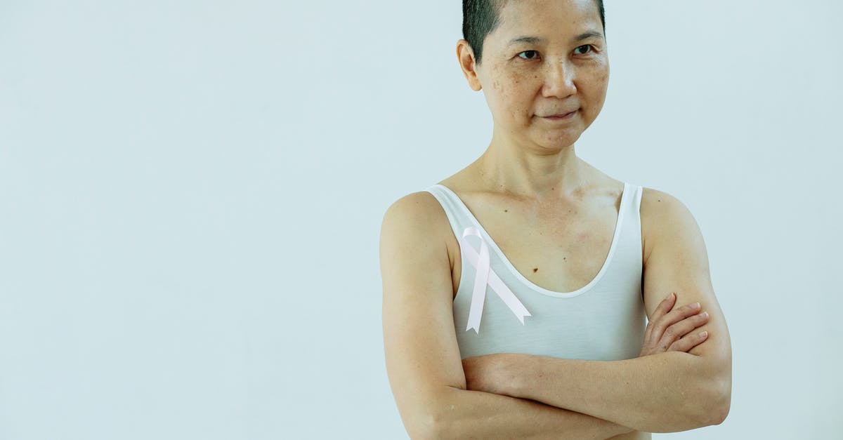 How did Hansel remove his own underwear in Zoolander? - Asian woman in white bra in studio