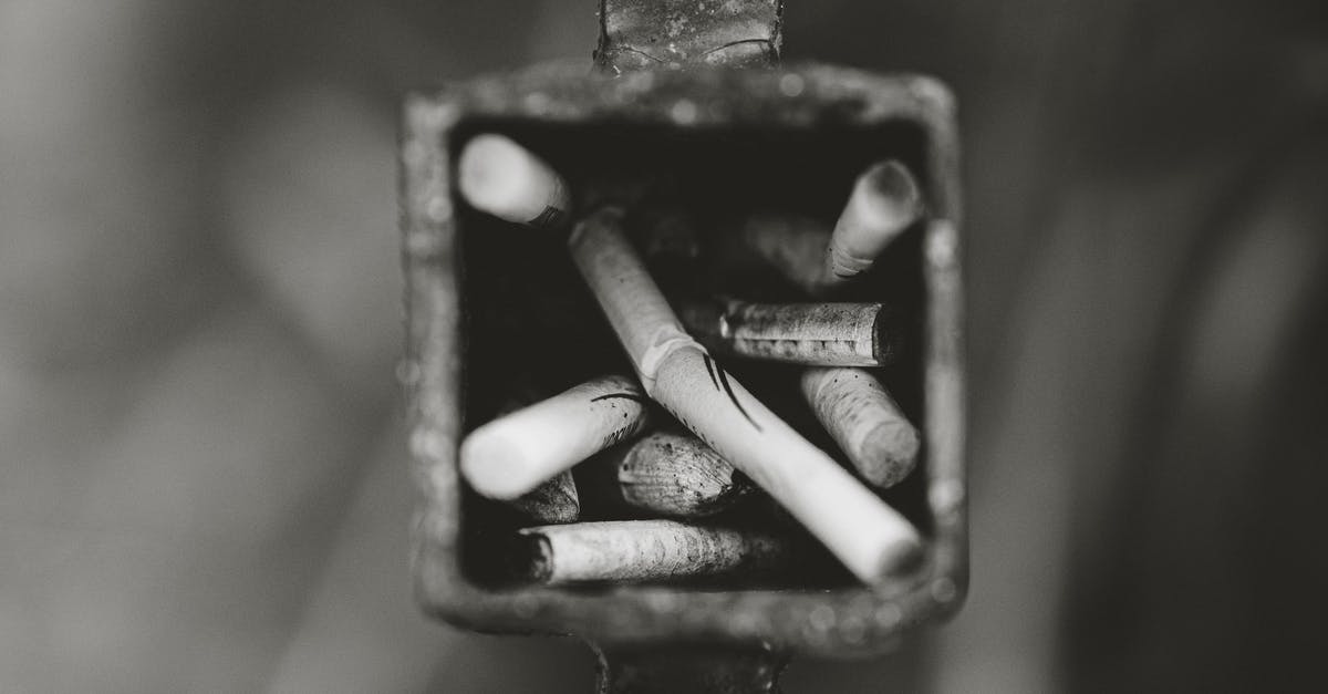 How did Jesse end up with the cigarettes in his pocket? - Grayscale Photography of Cigarette Butts in Ashtray