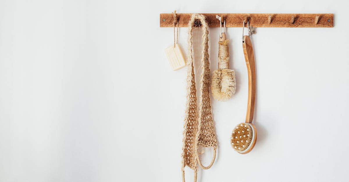 How did Kaecilius get set free? - Eco friendly sisal brushes back scrubber and soap hanging on wooden hook hanger in bathroom