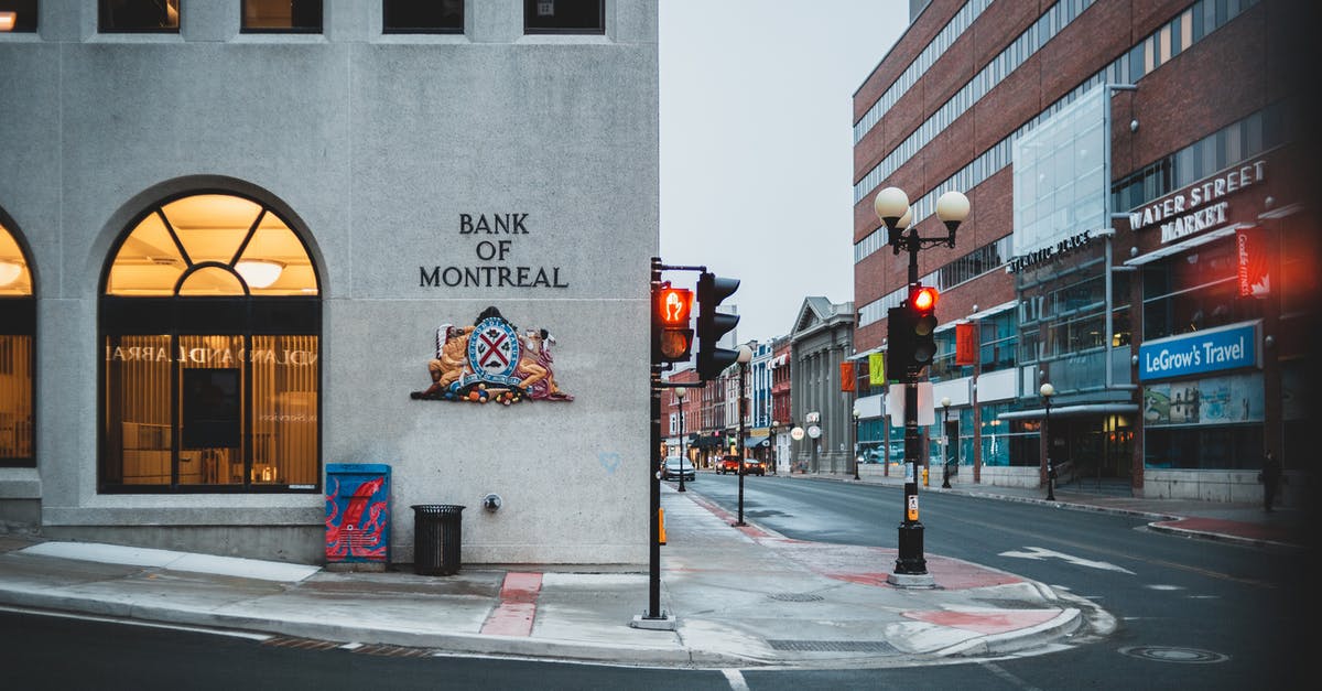 How did Lisbeth Salander empty the bank accounts? - Contemporary gray building of city bank