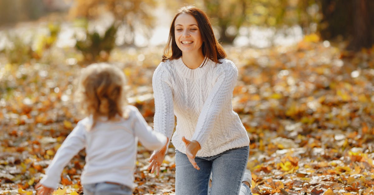 How did Superman know that Lois was falling to catch her in time? - Happy young mother and daughter having fun in autumnal park