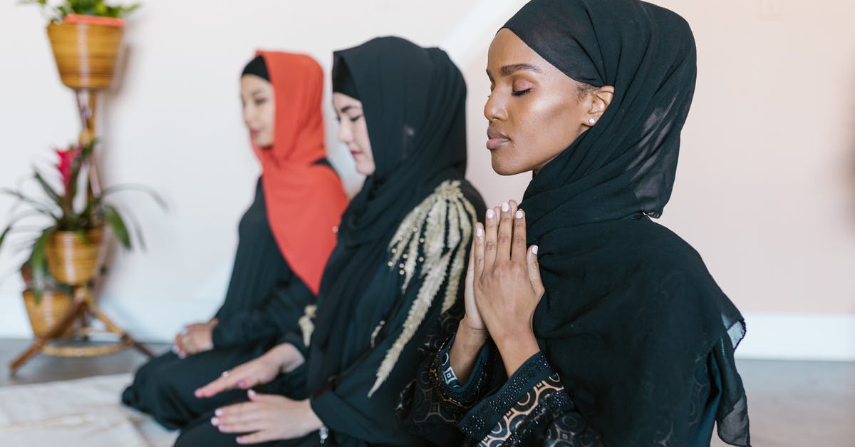How did Susan understand who Joe Black was? - Women in Black Hijab Praying