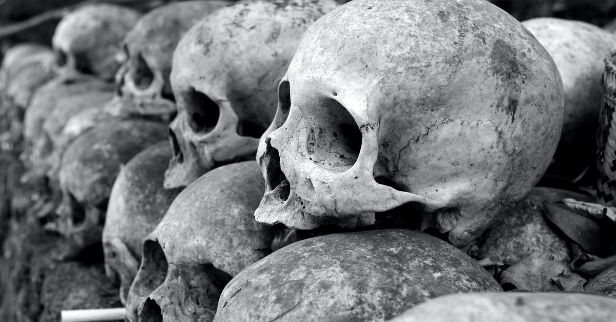 How did the doctor know the cause of death just by putting his ear on the dead body? - Grey Skulls Piled on Ground
