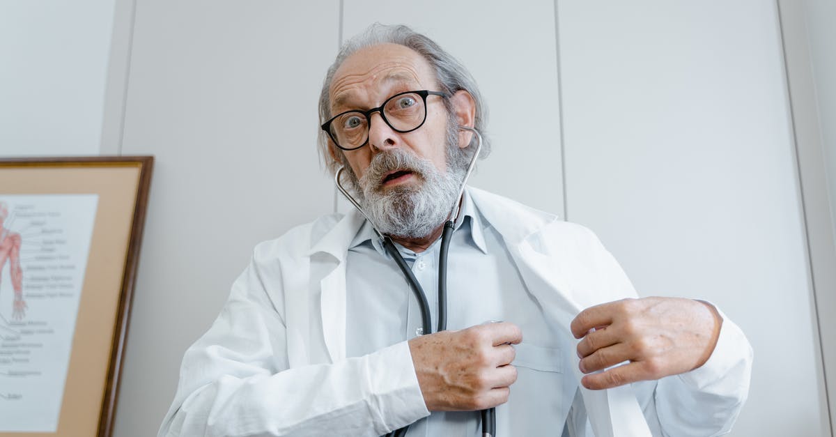 How did The Doctor revert his aging? - Man in White Dress Shirt Wearing Black Framed Eyeglasses