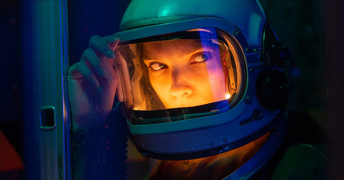 How did the female astronaut turn into an ape? - Woman Wearing Blue Helmet 