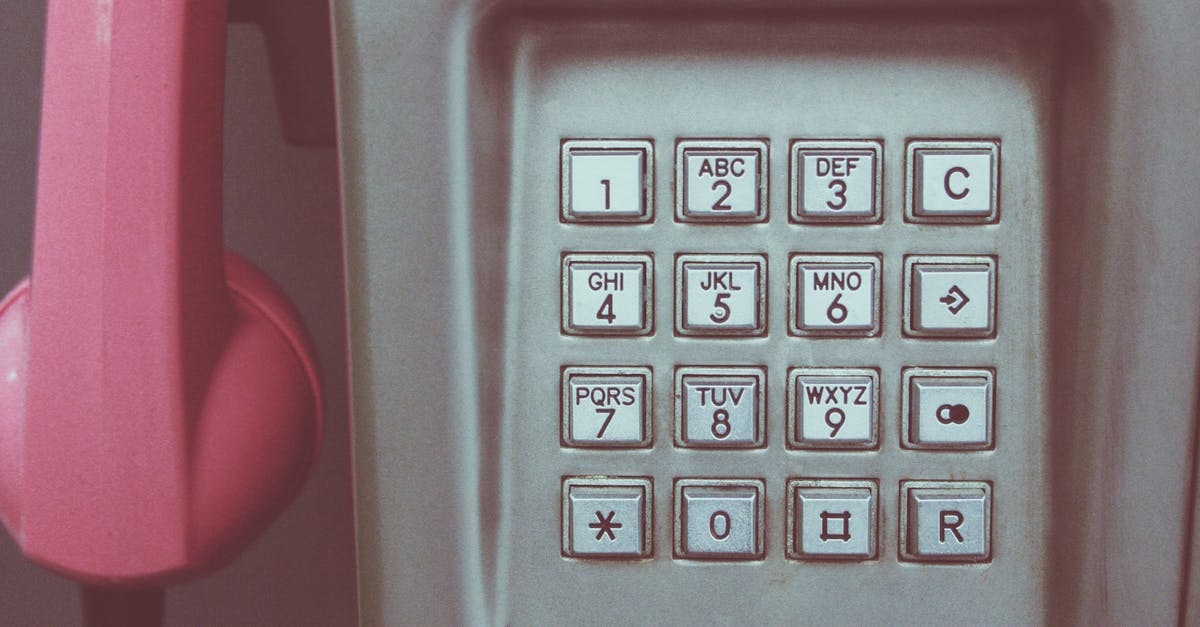 How did the phone ring when receiver was being held by Morrie? - Free stock photo of antique, call box, calling