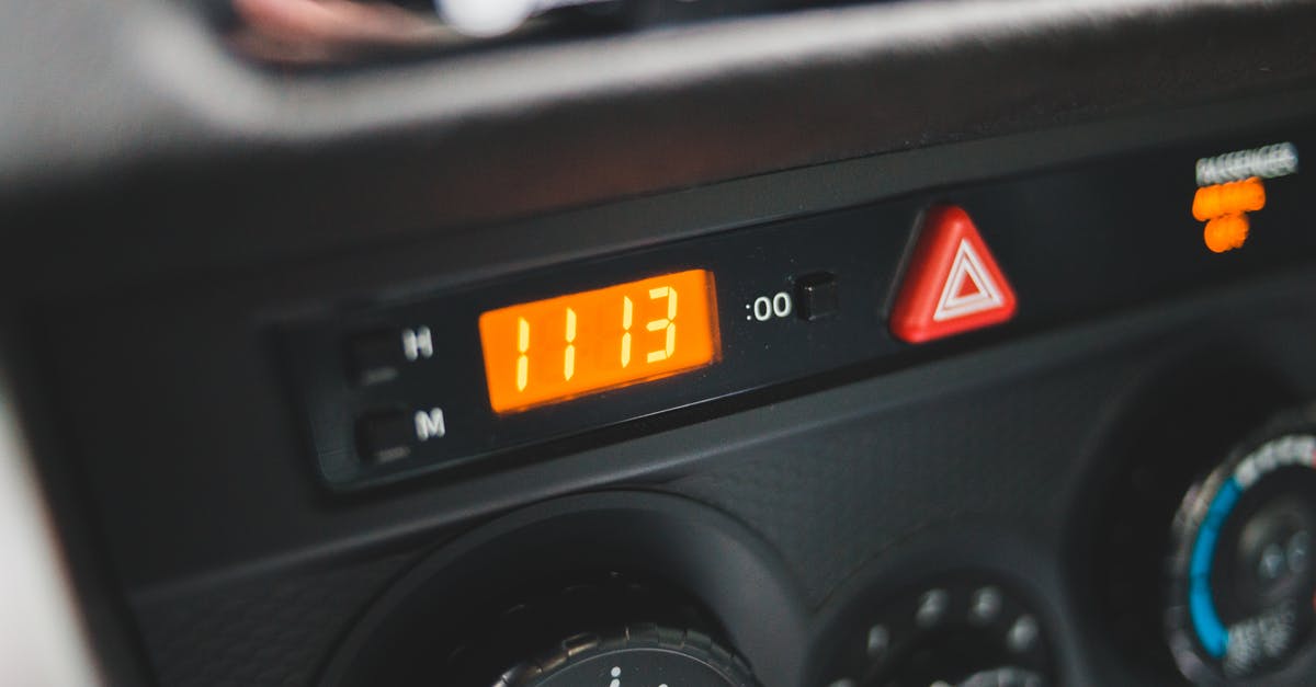 How did the time drive start up again? - Electronic clock on dashboard of car