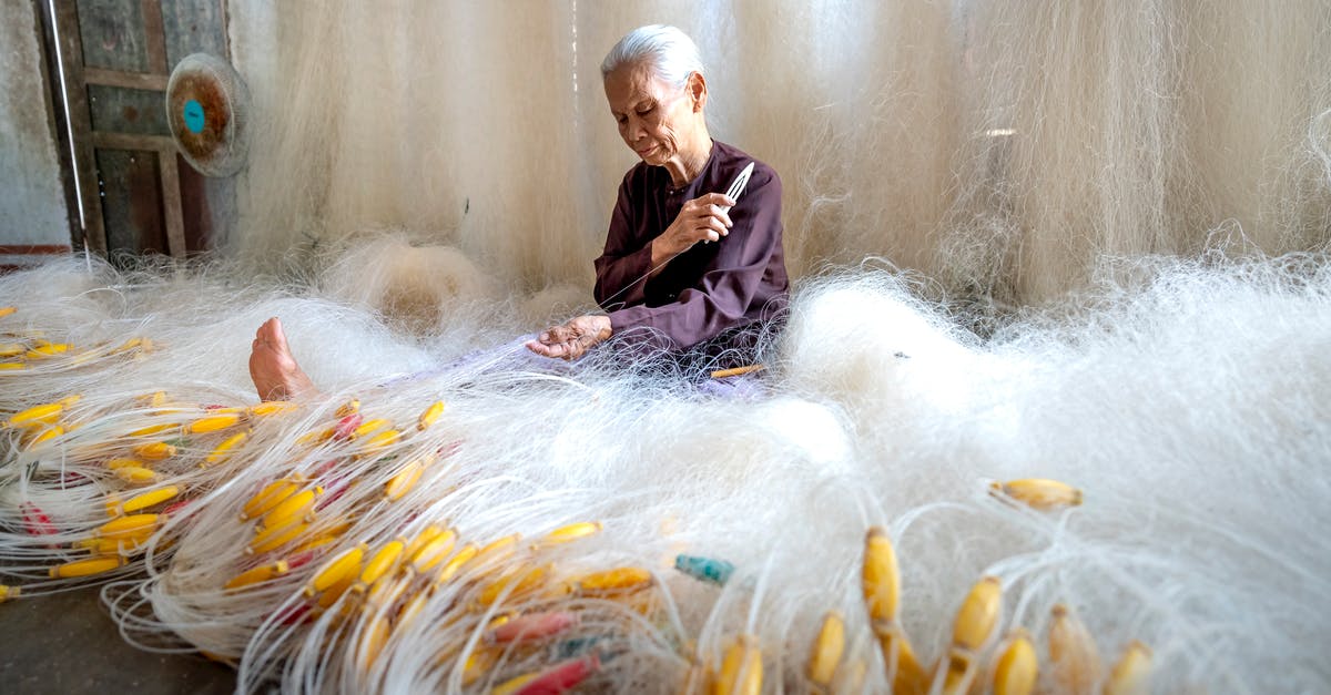 How did they make Yogurt so short? - Senior Asian woman making fishing net at home