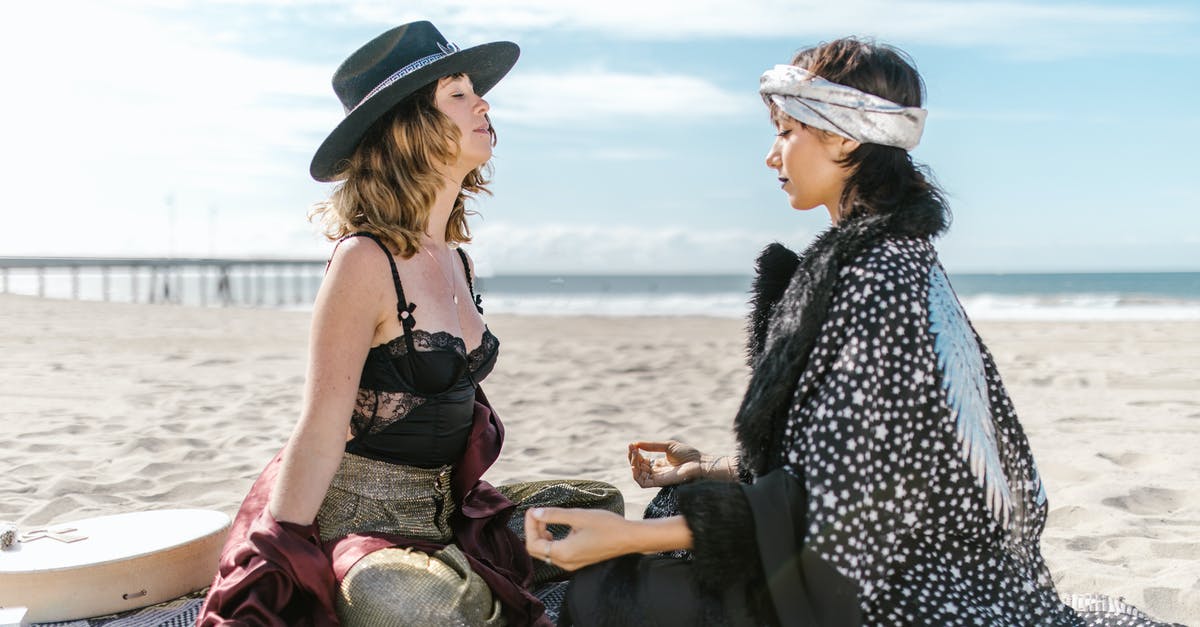 How did Watson realize the gipsy woman had been coached by Sherlock? - 2 Women Sitting on Beach