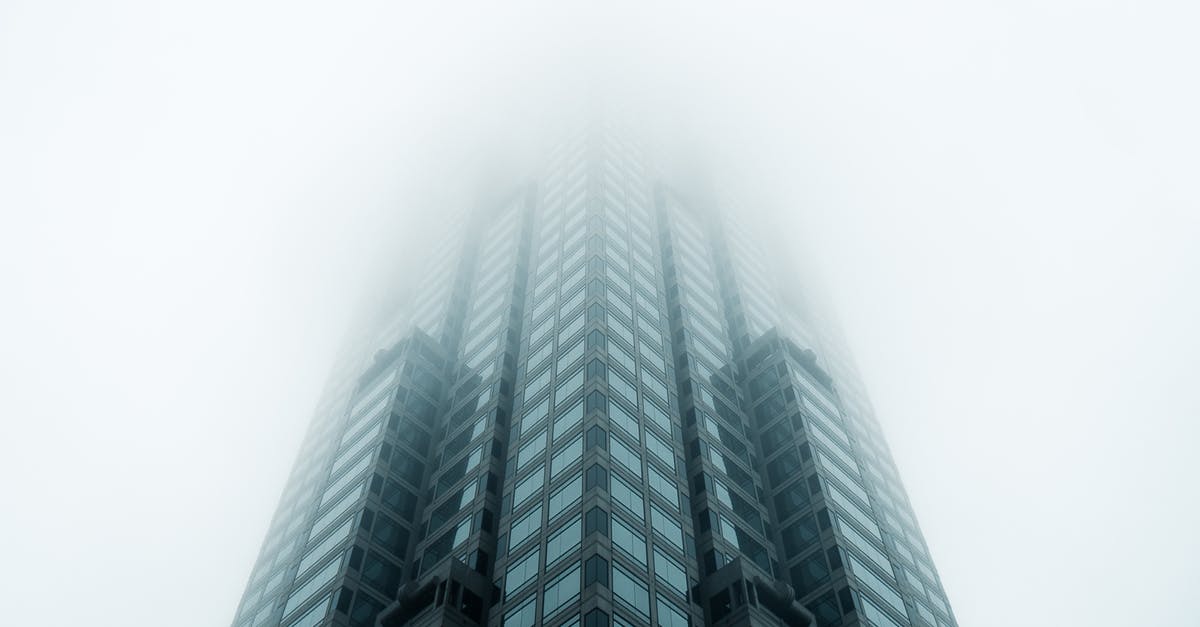 How do movies make small places fog up - Low Angle Photo of High Rise Building