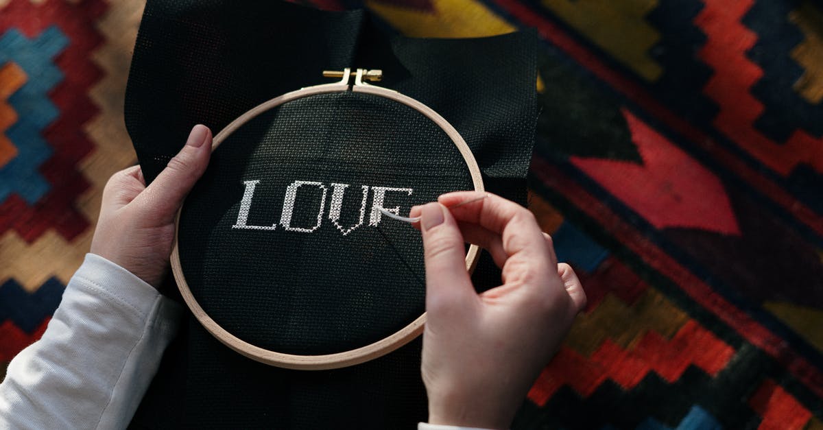 How do the Oscars work? [closed] - Close up of a Person Doing Embroidery Work on Black Fabric 