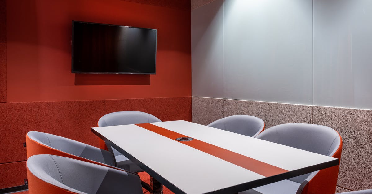 How do they fact-check Orange Is the New Black? - Modern conference room with TV