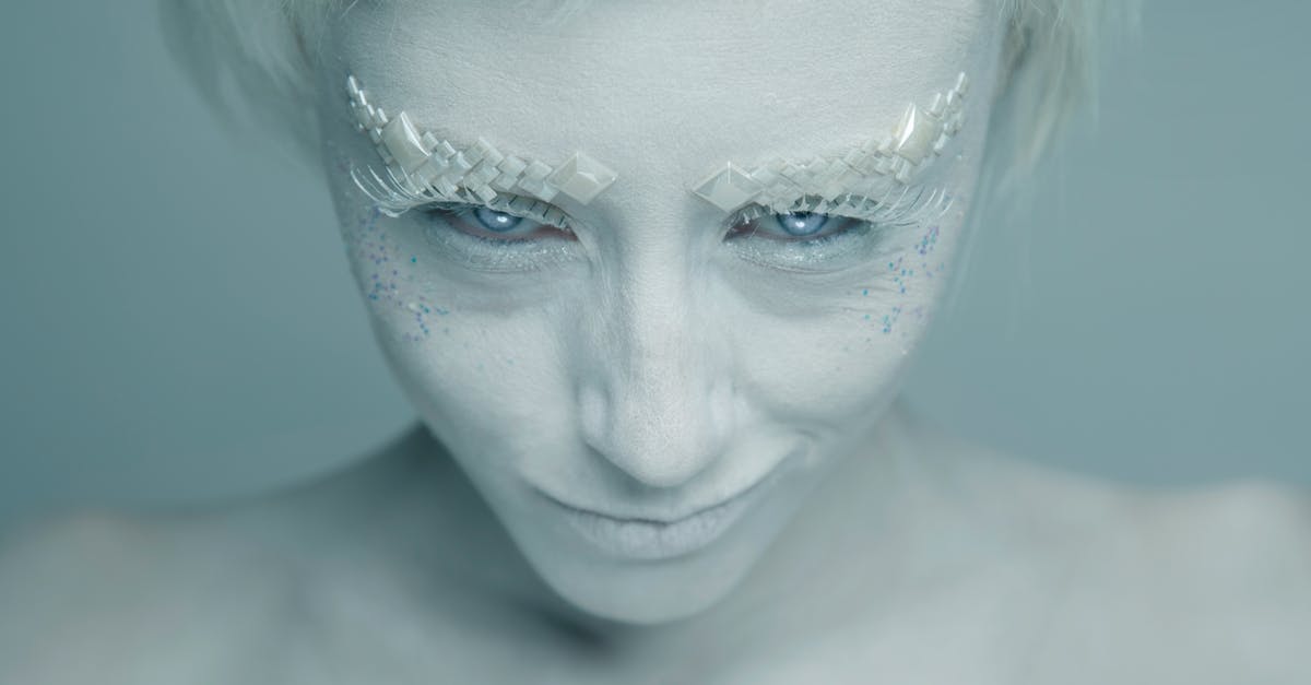 How do White Walkers change the dead people into Zombies? - Woman With Blue and White Face Paint