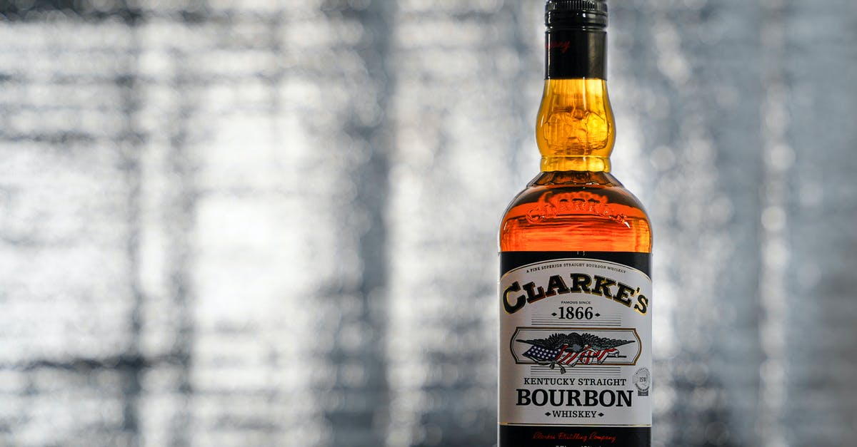 How does Dr. Doofenshmirtz know Perry's name? - A Product Photography of Clarke's Bourbon Whiskey in Close-up Shot