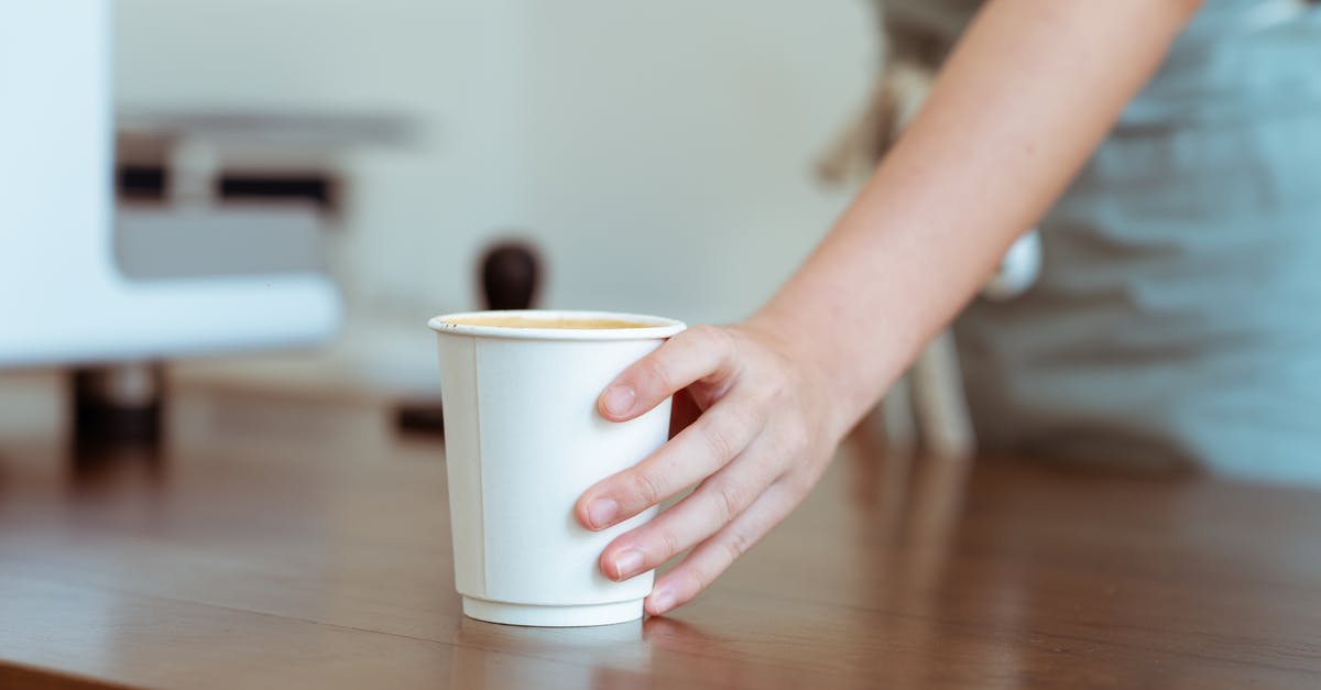 How does Frank pass the Bar Exam? - Crop barista serving coffee in paper cup