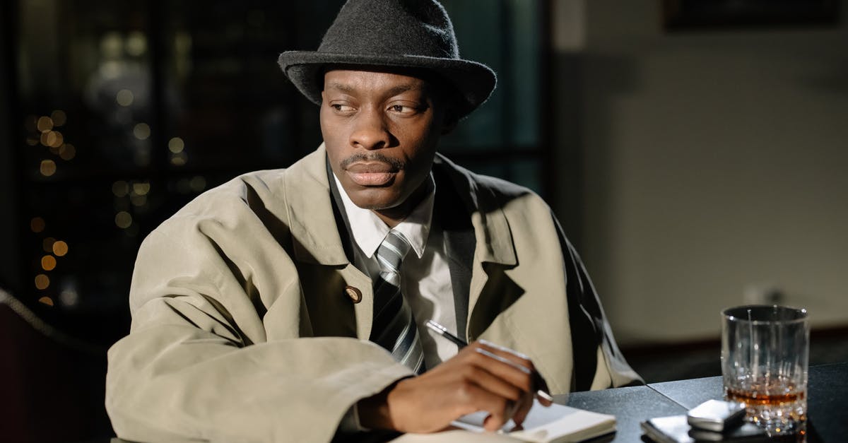 How does one interpret the plot wrap-up of Beasts of No Nation? - Photo of Man Taking Down Notes