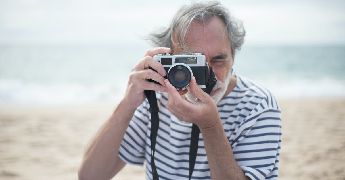 How does the beach actually exist? - Free stock photo of beach, binoculars, elderly