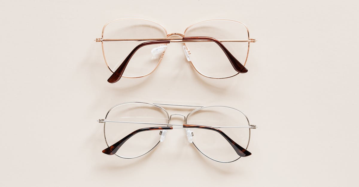 How far back do I need to watch Doctor Who for it to still make sense? - From above of fashion spectacles for vision with golden and silver metal shells placed on white table