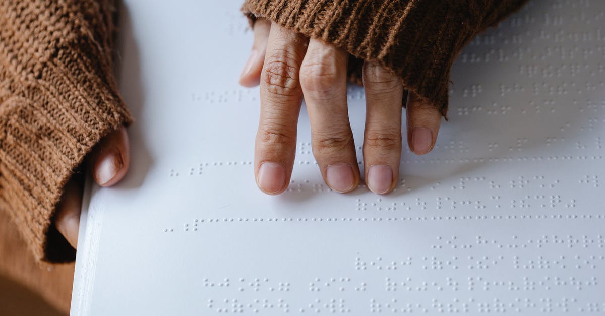 How far does the depiction of the pirates' characters match the book? - Photo of Person Using Braille