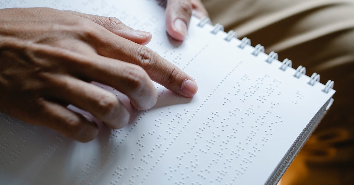 How far does the depiction of the pirates' characters match the book? - Photo of Person Using Braille