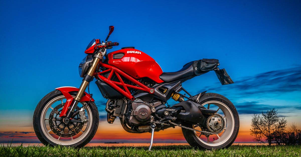 How fast is Bifrost? - Red and Black Ducati Monster 796 on Green Grass 