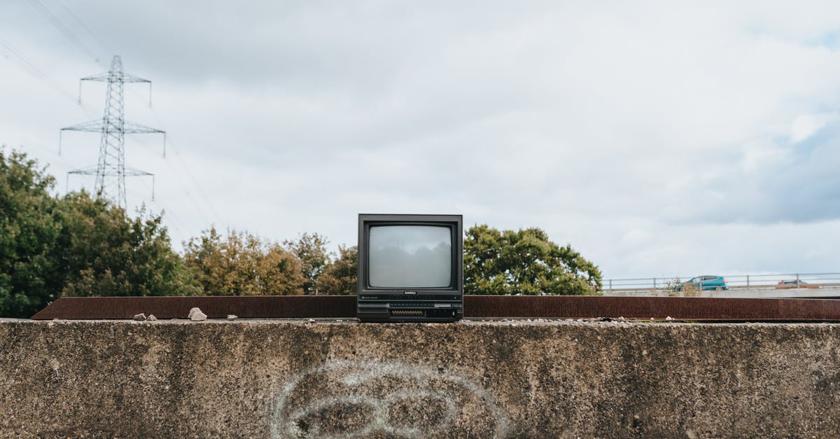How hitting small transformer blacked out whole rio city? - Small vintage TV set on stone fence