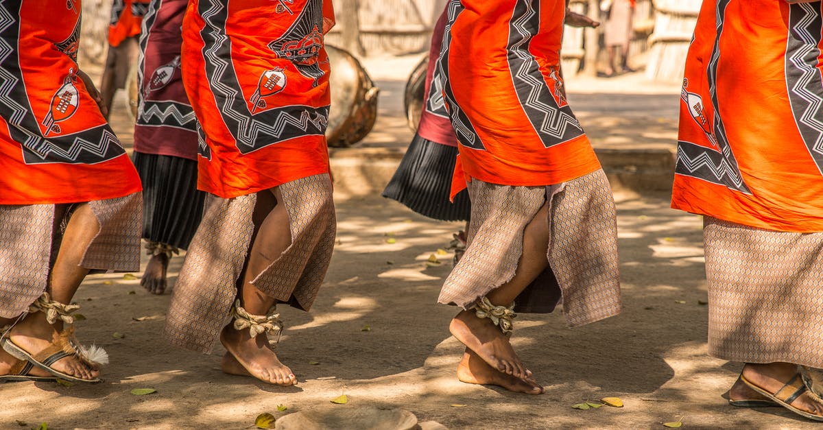 How long will the strike last? - Barefoot Legs of African Women Dancing Ceremonial Dance