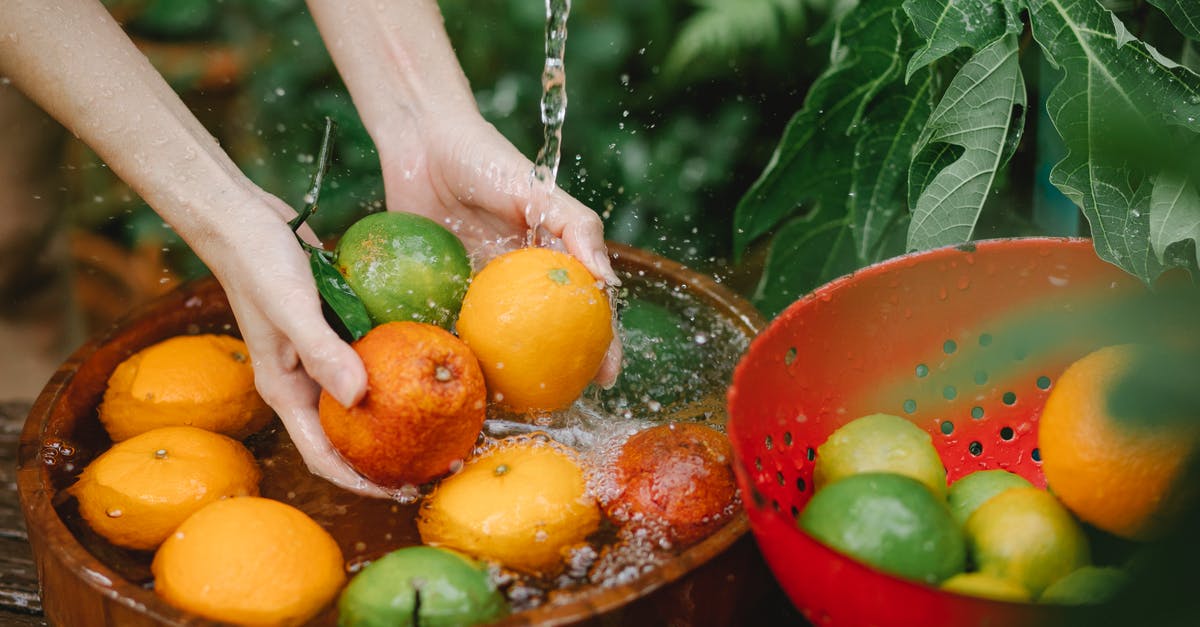 How much Cantonese and Mandarin is in Everything Everywhere all at Once? - Woman washing fresh fruits in tropical orchard