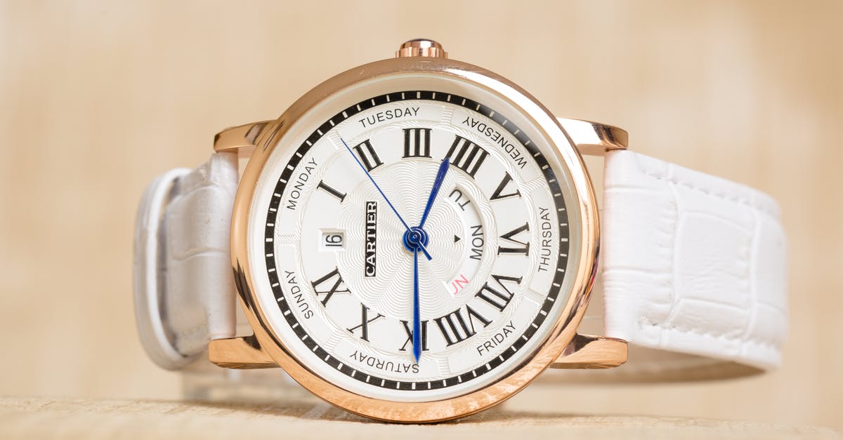 How much time elapsed? - White and Gold Analog Watch