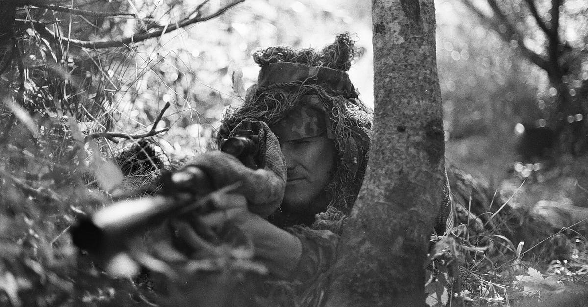 How was Duncan able to predict the exact moment a silenced sniper rifle would be fired? - Grayscale Photography of Sniper