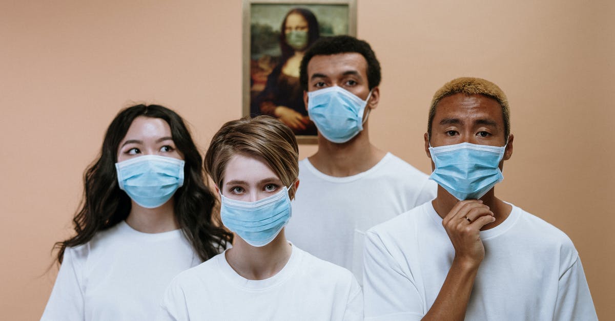 How was Mitch Emhoff immune to the disease? - Group Of People Wearing Face Mask