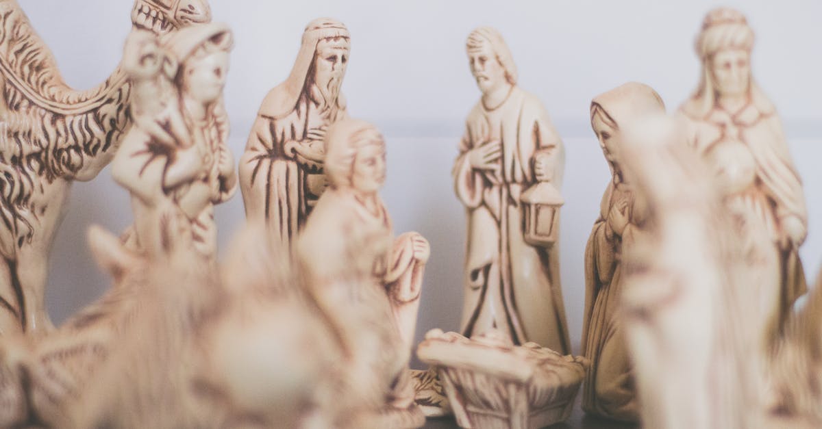 How was The Second Coming received by Christian groups? - Shallow Focus Photography of Religious Figurines