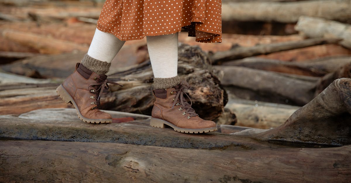 I want to know the fruit name in Hundred Foot Journey [closed] - Unrecognizable crop woman wearing warm casual boots and skirt walking on log while spending time in countryside during weekend trip in autumn