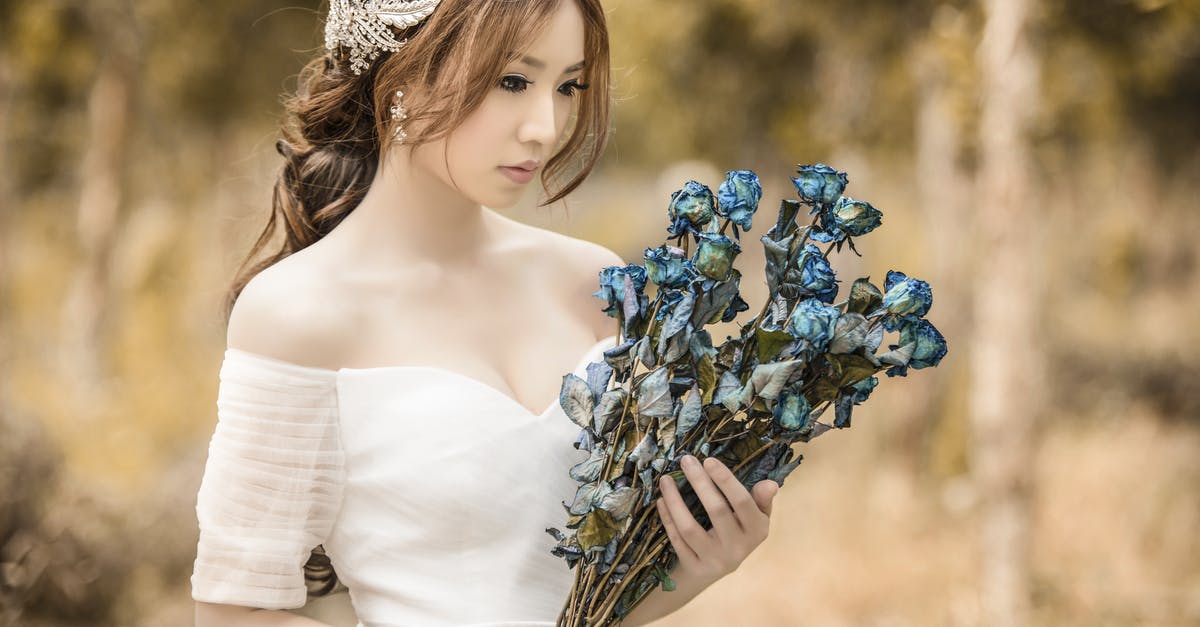 In Before I Fall, did the main character really have to do this? - Woman Holding Blue Flowers