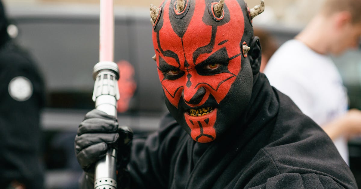 In Star Wars, why didn't all the Jedi use the double lightsaber like Darth Maul? - Close-up Shot of a Person in Darth Maul Costume