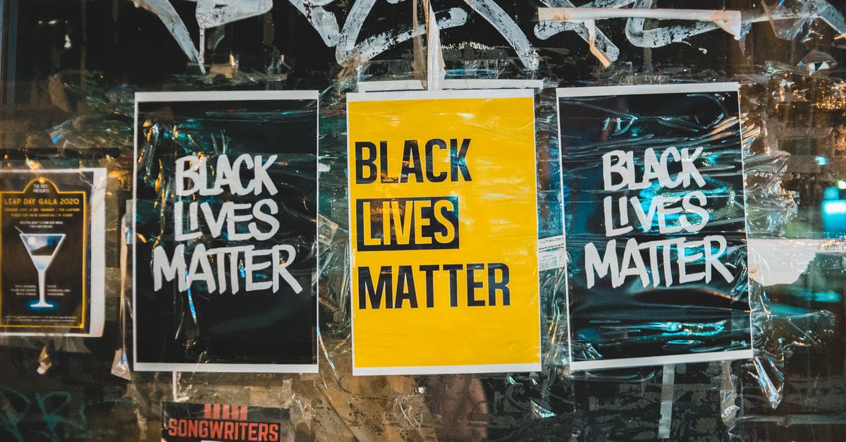 In the film "Limitless" (2011), why were the murder incidents relating to Eddie Morra downplayed by police? - Slogan Black Lives Matter on small rectangular paper sheets on surface of painted glass