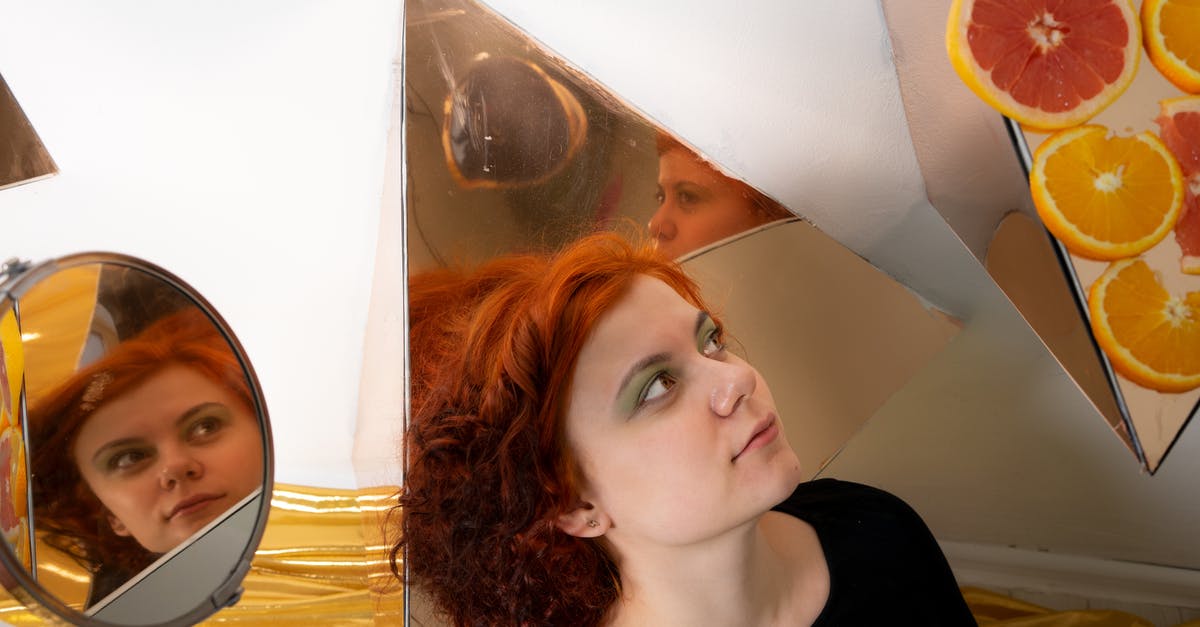 In the title sequence, what is the strange futuristic noise/blinking effect? - Redheaded woman surrounded by mirrors