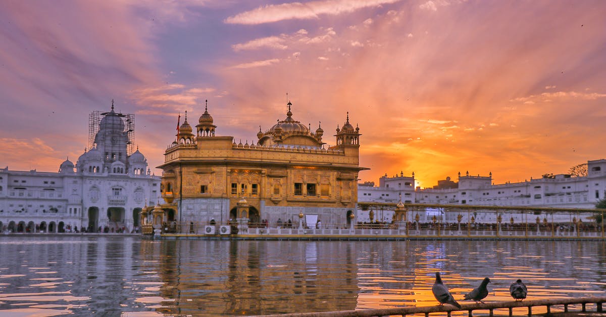 Is Katherine Hepburn's shaking real or acted in On Golden Pond? - Exterior of Sikh gurdwara golden temple with dome located near water against cloudy sky in evening time in city in India