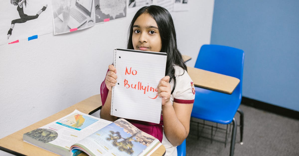 Is Latika from "Slumdog Millionaire" Muslim? - Girl Showing a Message Written in a Notebook
