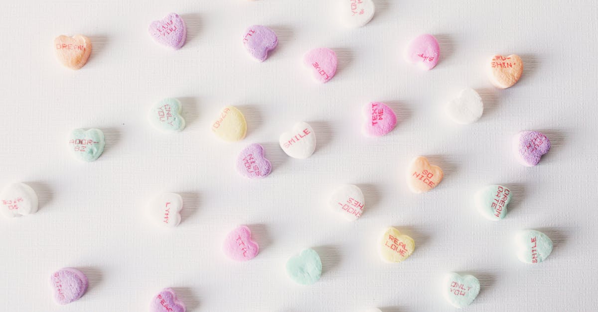 Is Strickland's candy based on a real candy? - Top view composition of multicolored small heart shaped sweets placed on plain white surface