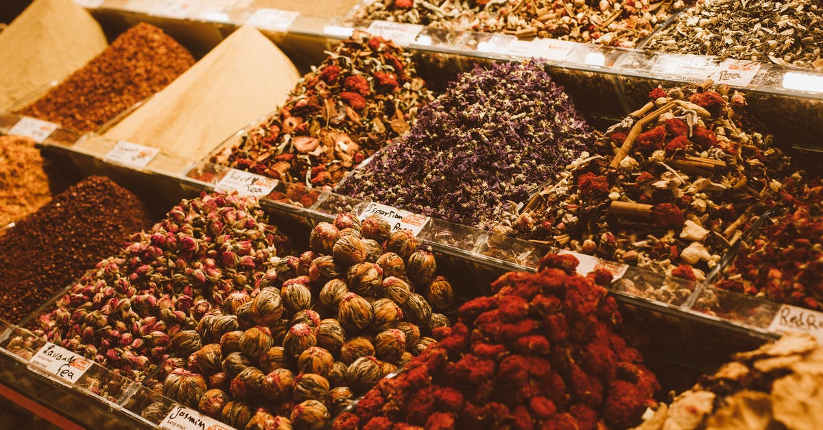Is that a mistake in Lavender movie? - Containers Full of Spices on a Market Stall 