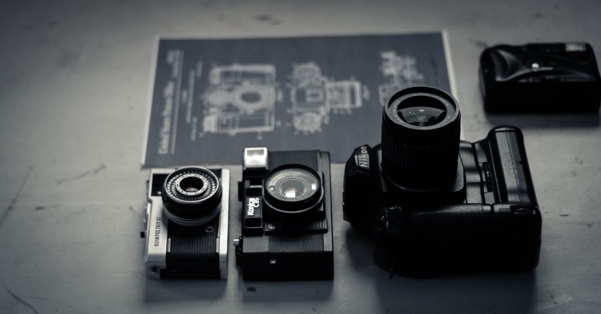 Is the cinema from Adaline real? - Retro photo cameras arranged on table