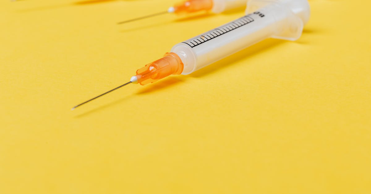 Is the drug used to stop infection in The Rock real? - Medical single use disposable syringe without protective cover on needle and with empty barrel placed on bright yellow surface