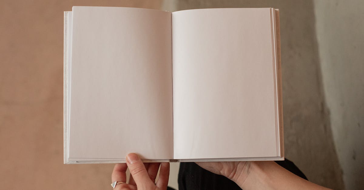 Is the story ever evolved? - Woman holding book with blank pages