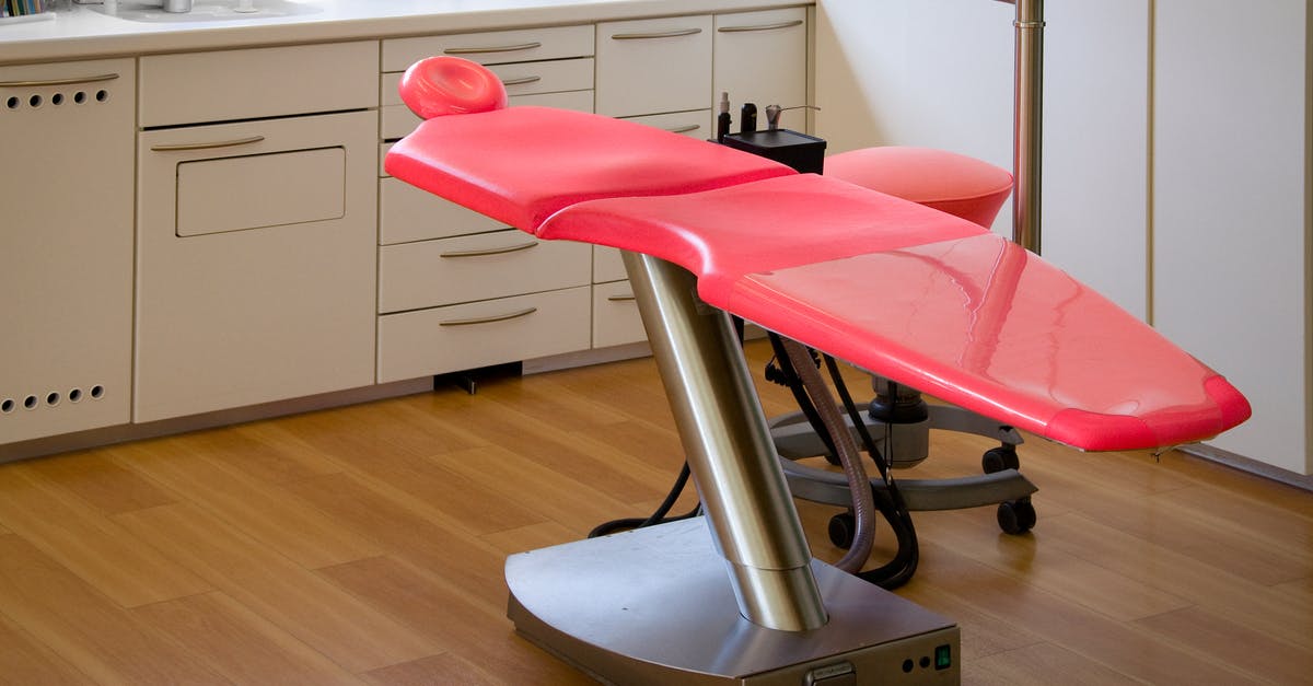 Is the villain in Disney's Princess and the Frog a doctor, and what is he a doctor of? - Gray Metal Framed Red Dental Treatment Chair
