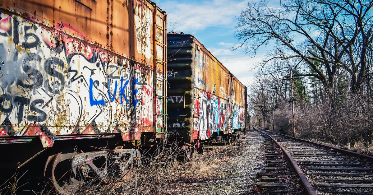 Is there a precedent for the way the Lincoln Letter was used in The Hateful Eight? - Old railway carriages with graffiti on surface under cloudy sky