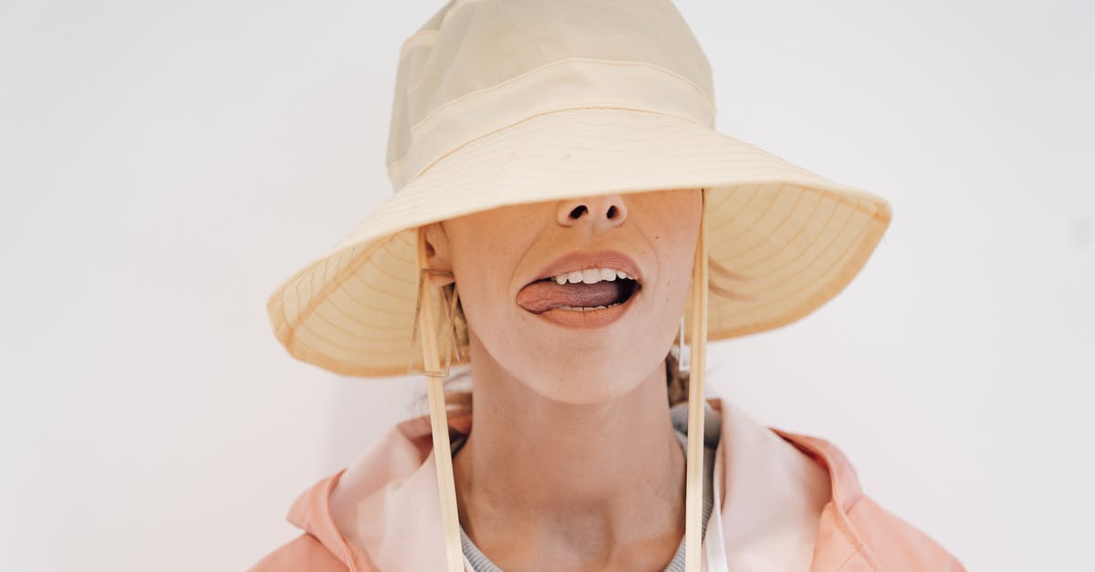 Is there a trend in recent crime shows to complement eccentric protagonists with grown-up and intelligent daughters? Why? - Stylish woman in hat with tongue out